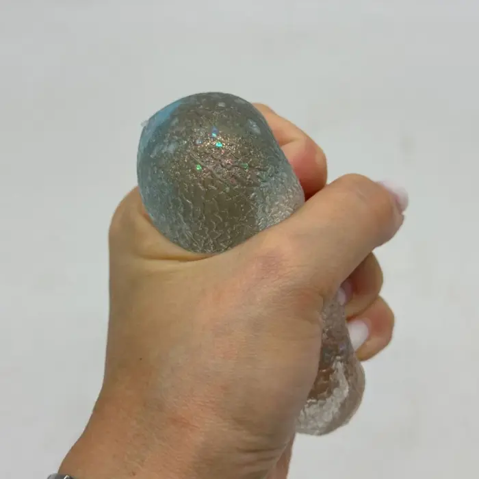 Сквиш антистресс "Капля воды с фигурными блестками" 7cm (Оранжевый)